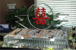 Ice Sculpture Table with Food Items on it