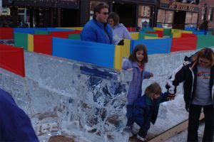 kids and adults enjoying Ice Sculptures