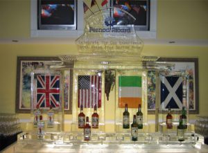 Bottles of Drinks and Flags behind them