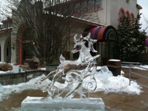 a beautiful ice Sculpture of a deer