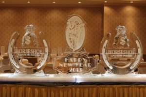 Three award made of glass on a table