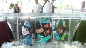 three men at an ice bar counter