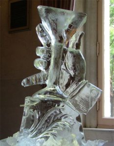 closeup shot of an ice Sculpture of a hand with a glass