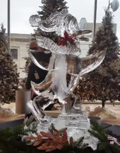 Ice Sculpture of Donald Duck On a Table