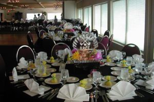 a dining table with plates and other items