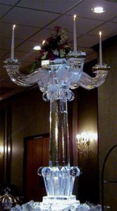 Ice Sculpture of a candle stand with candles